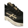 Calzature sneaker realizzata in tessuto e camoscio con inserti in pelle