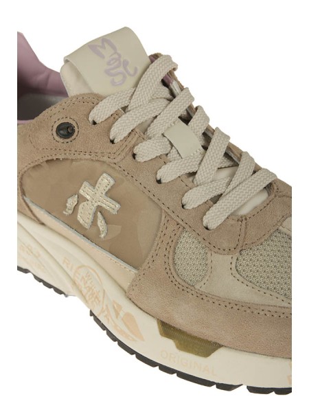 Calzature sneaker realizzata in camoscio e tessuto con inserti in pelle suola gomma