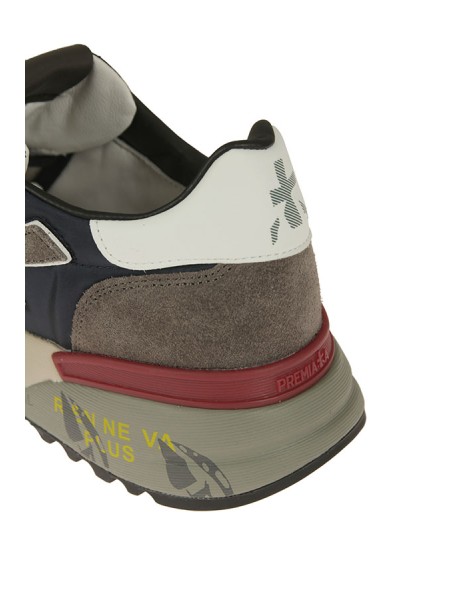 Calzature sneaker realizzata in camoscio e tessuto con inserti in pelle suola gomma