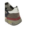 Calzature sneaker realizzata in camoscio e tessuto con inserti in pelle suola gomma