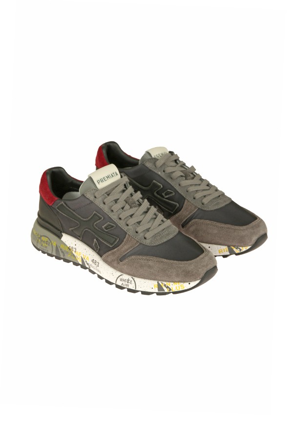 Calzature sneaker realizzata in camoscio e tessuto con inserti in pelle suola gomma