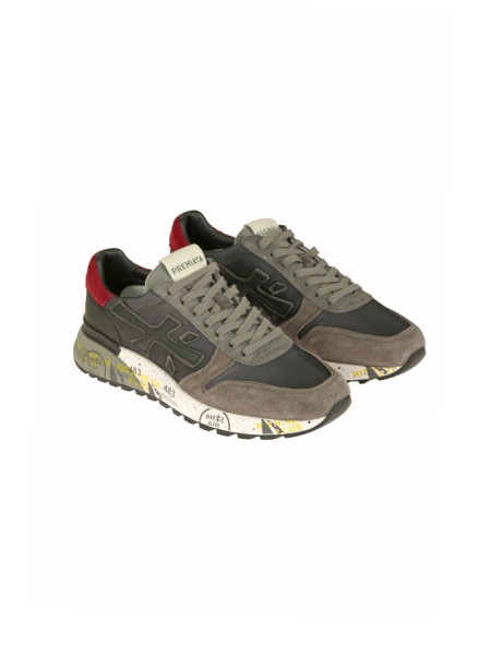 Calzature sneaker realizzata in camoscio e tessuto con inserti in pelle suola gomma