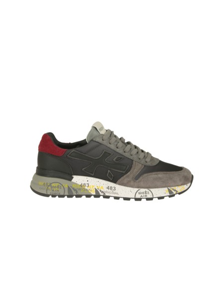 Calzature sneaker realizzata in camoscio e tessuto con inserti in pelle suola gomma