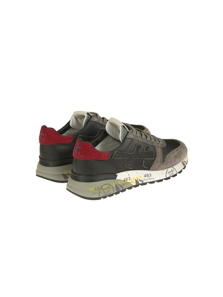 Calzature sneaker realizzata in camoscio e tessuto con inserti in pelle suola gomma